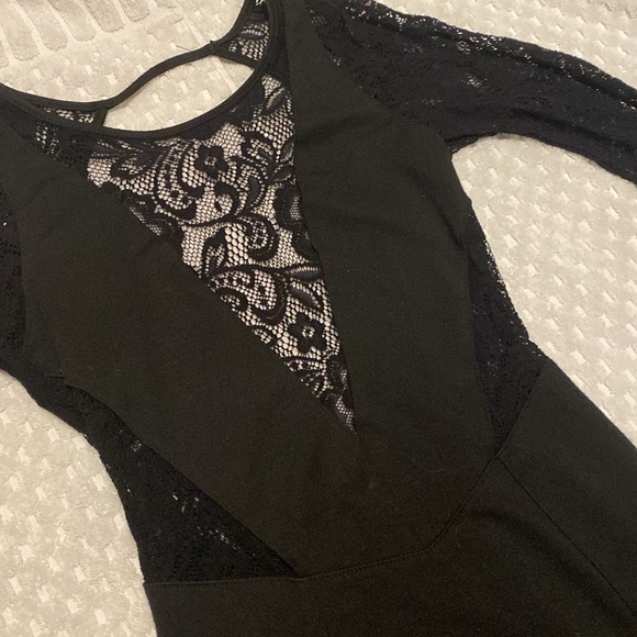 Black dress with lace cutouts - Picture 2 of 3